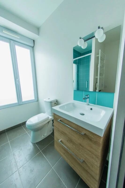 Photo 12 : Immeuble de rapport de qualité – Baud – Rendement 6,6% - 1 local commercial + 3 appartements