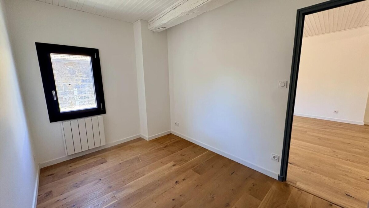 Photo 10 : Coup de coeur pour ce Charmant T2 de 52 m² sous les toits – Intramuros, quartier recherché avignonnais