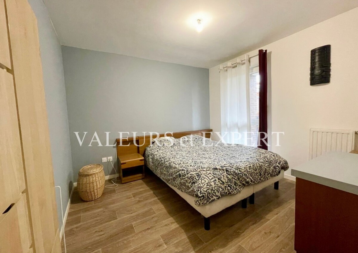 Photo 4 : TB 2 PIECES DE PLAIN PIED, TERRASSE, PLACE DE PARKING