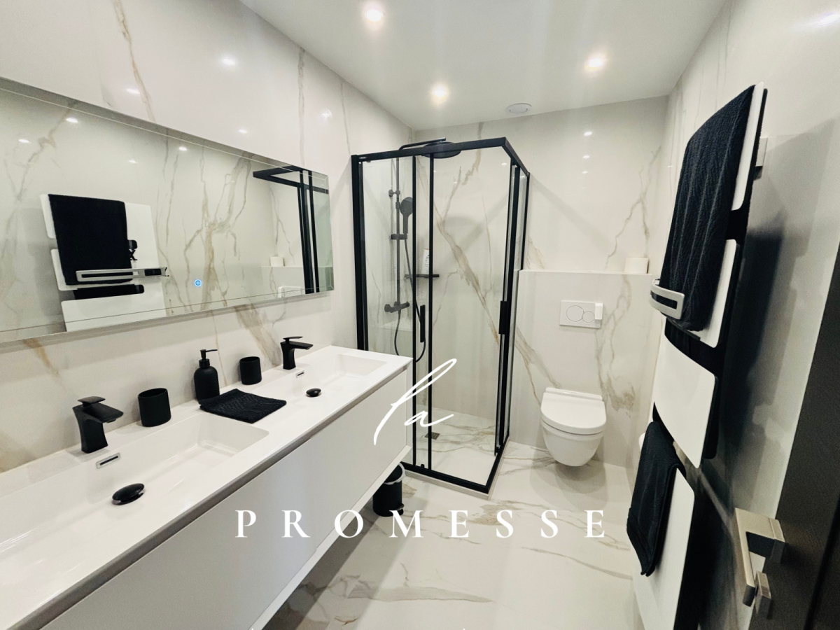 Photo 11 : ROOF TOP OCEAN - Appartement 3 Suites & Garage