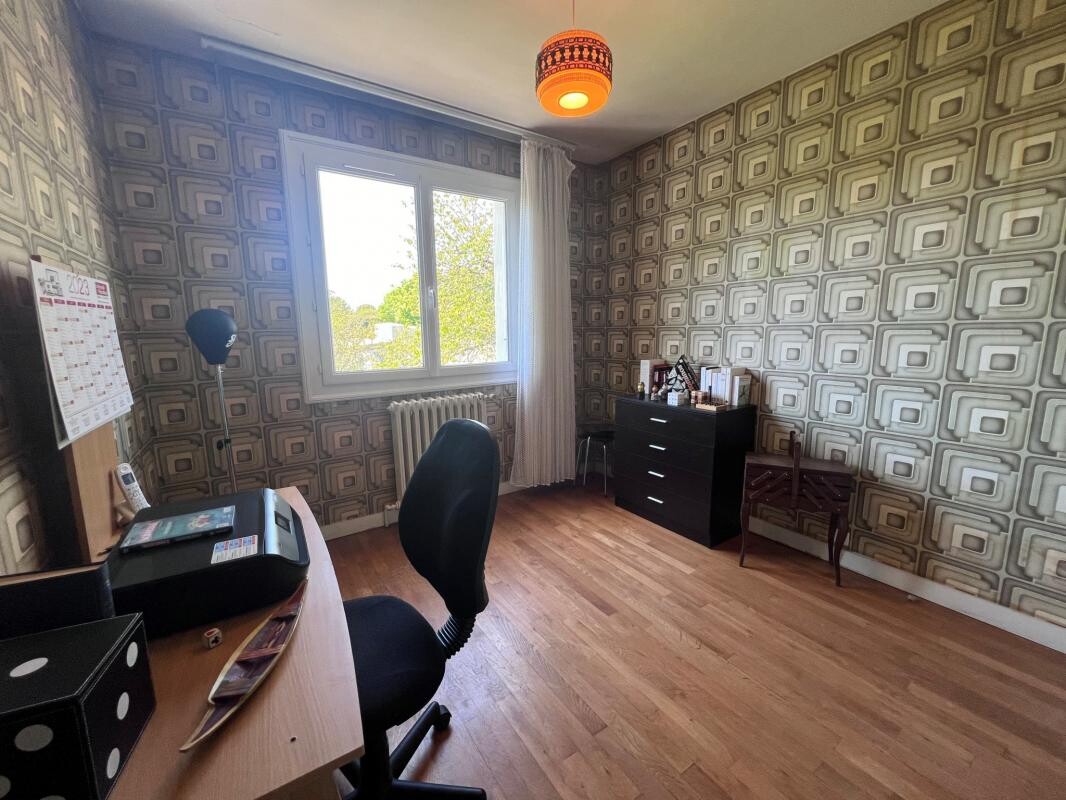 Photo 8 : Maison à beau potentiel à rénover -Ligugé-