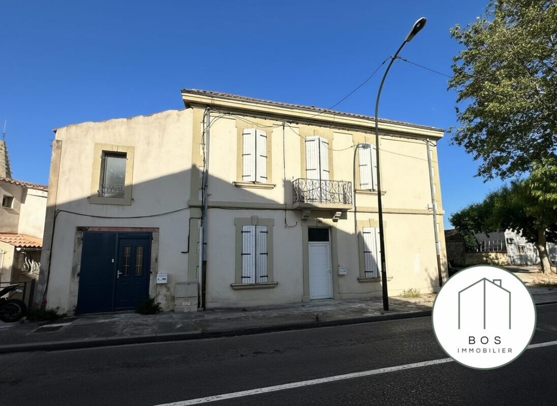Photo 1 : Maison de ville avec deux appartements loués