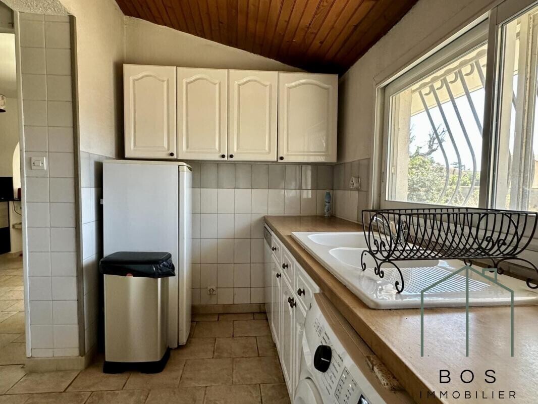 Photo 11 : Villa de plain pied avec jardin