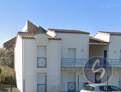 Photo 1 : Dans résidence fermée, avec stationnement, T1 bis, située à