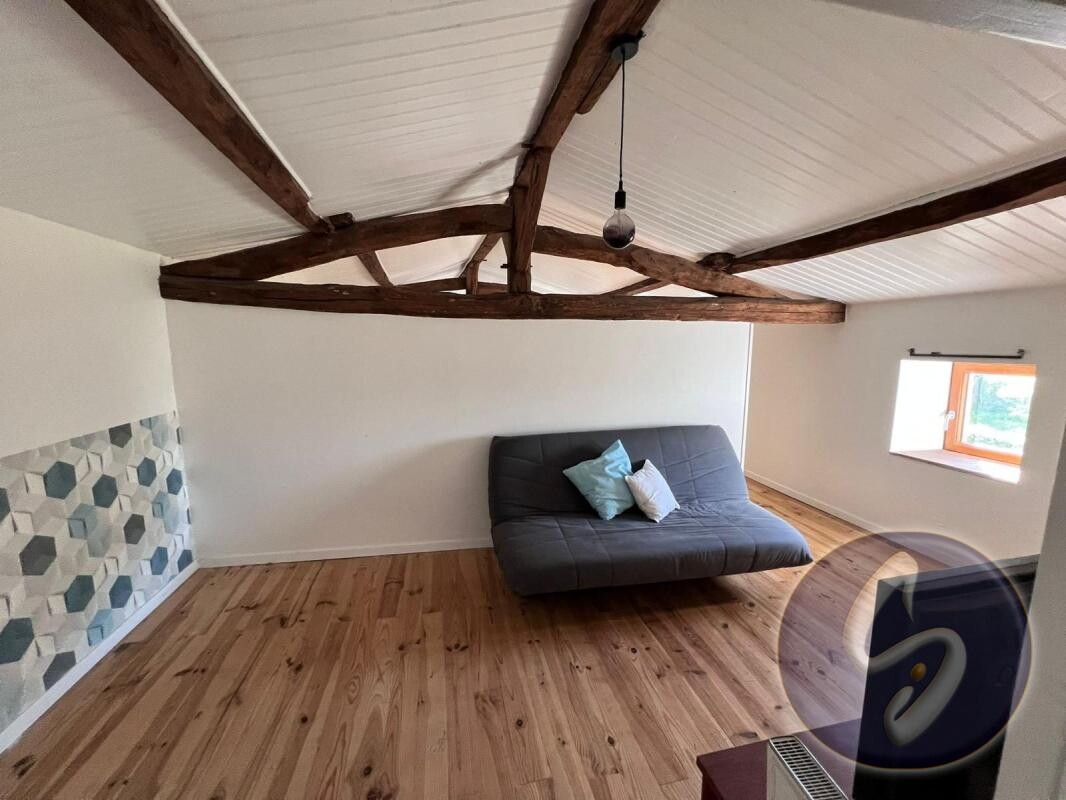 Photo 3 : MAISON ANCIENNE RENOVEE SUR GRAND TERRAIN