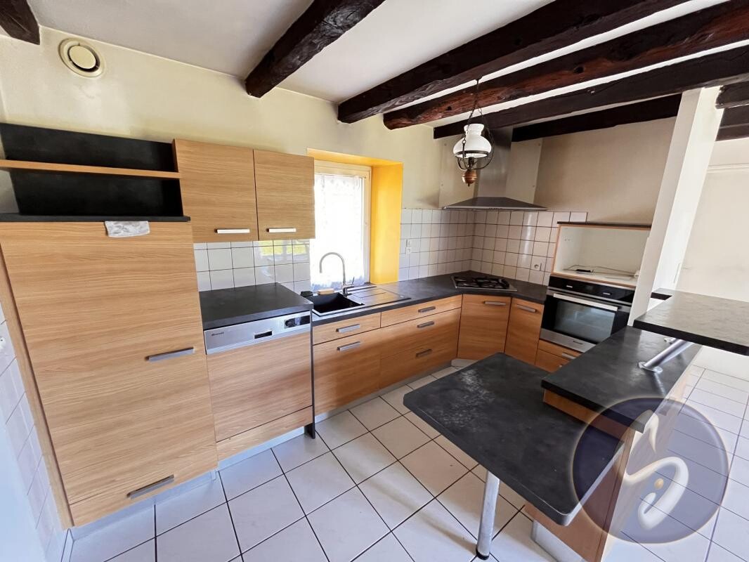 Photo 4 : Maison 4 pièces 82 m2 avec garage, dépendances et terrain