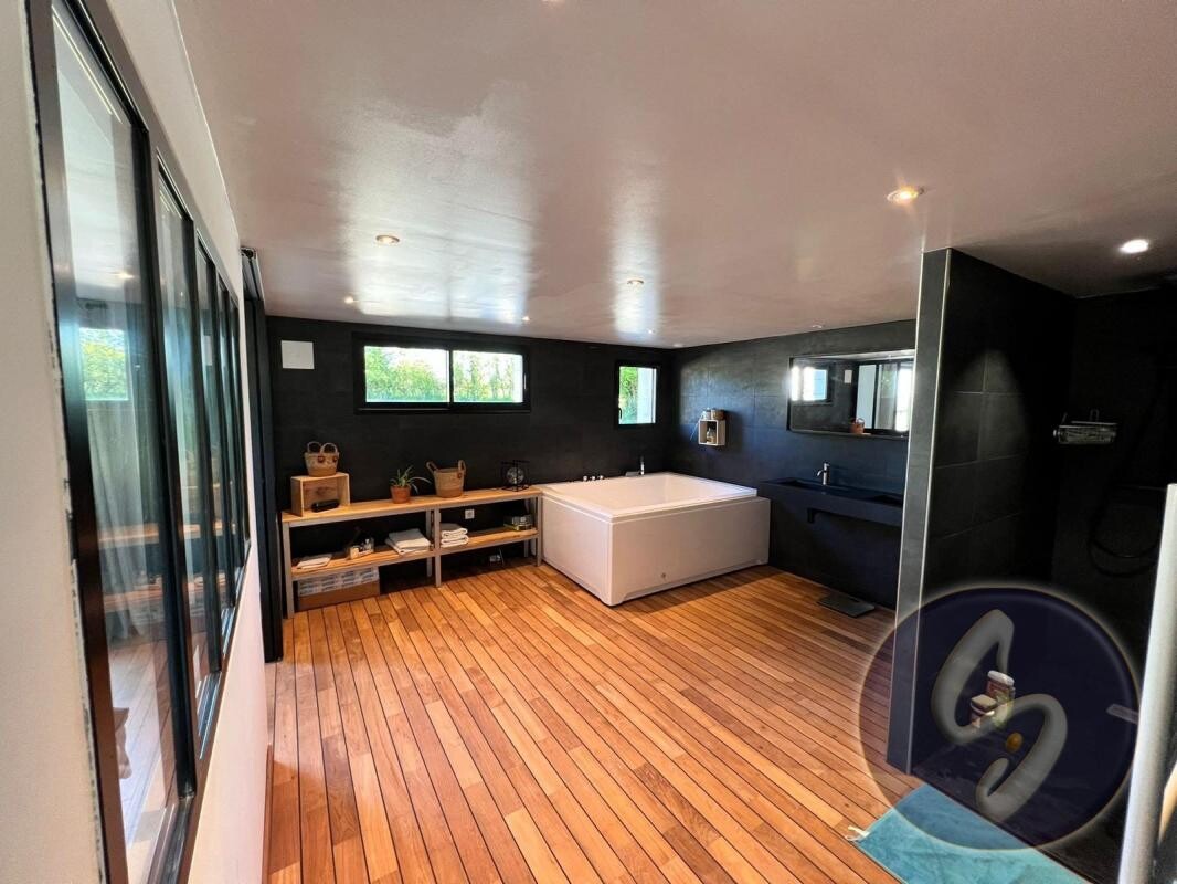 Photo 20 : MAISON ANCIENNE RENOVEE SUR GRAND TERRAIN