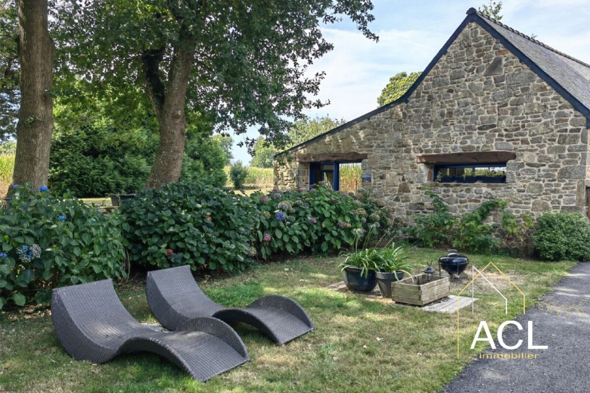 Photo 3 : Ensemble de 5 maisons avec piscine sur 9 000 m² arborés