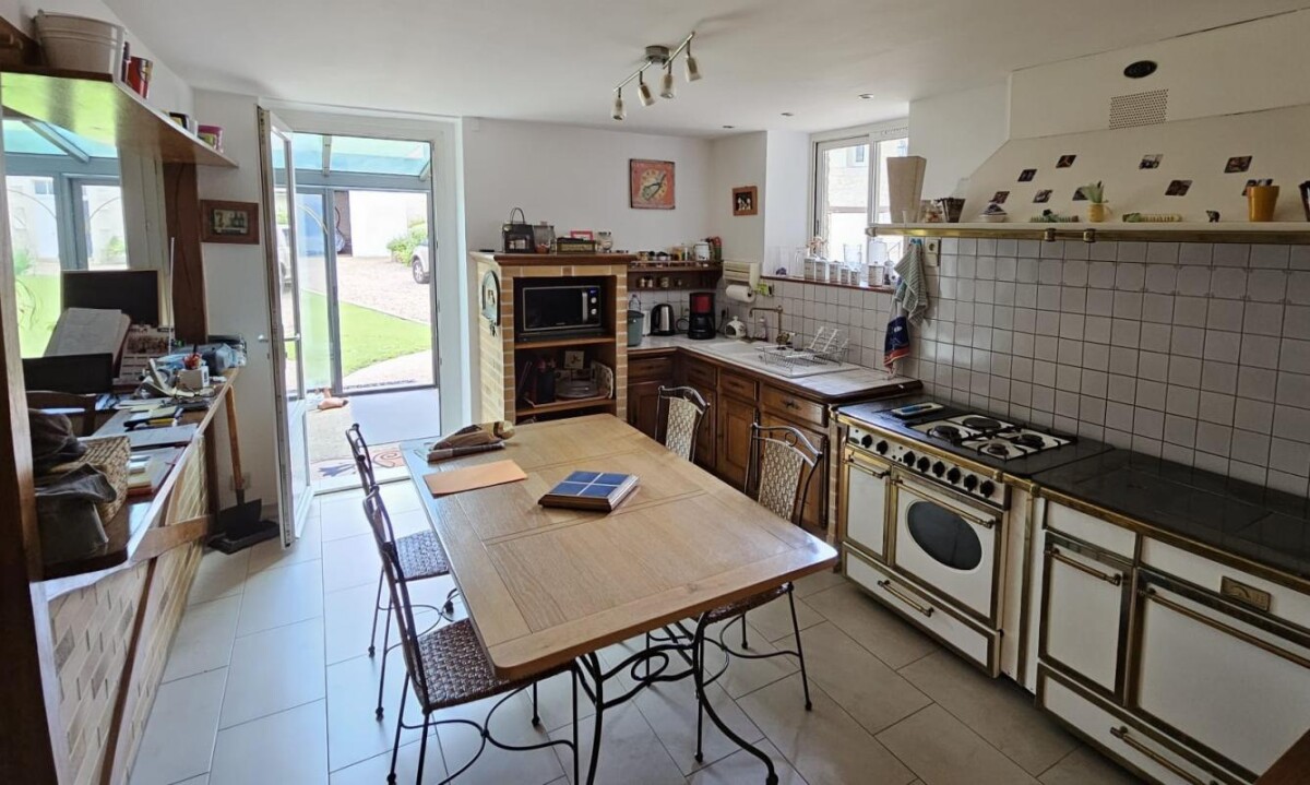 Photo 5 : Charmante maison de famille avec jardin et dépendances