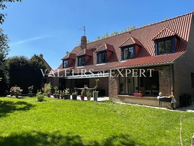 Photo 2 : TB DEMEURE INDIVIDUELLE EN SEMI PLAIN PIED - 258m²HAB