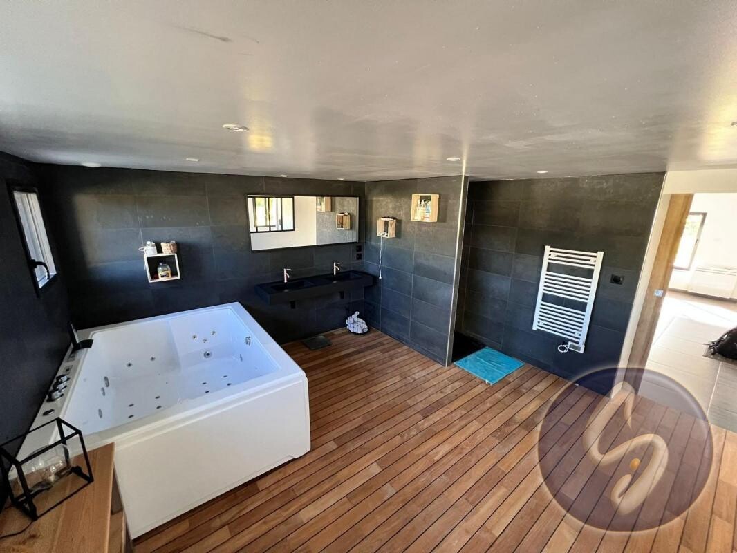 Photo 19 : MAISON ANCIENNE RENOVEE SUR GRAND TERRAIN
