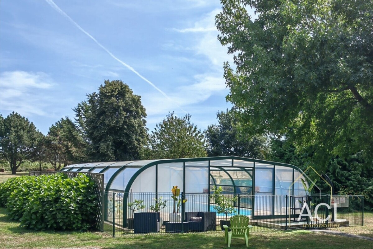 Photo 11 : Ensemble de 5 maisons avec piscine sur 9 000 m² arborés