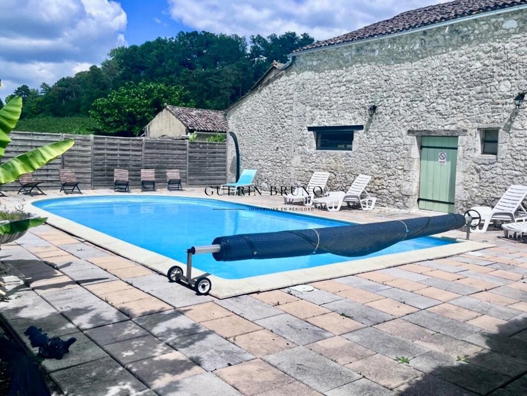 Photo 3 : Charmante propriété en pierre avec deux maisons et piscine au cœur du vignoble de Monbazillac